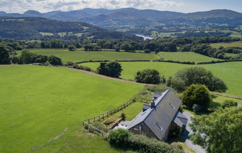The property commands spectacular and panoramic views of the Carneddau mountains (Snowdonia National Park). 