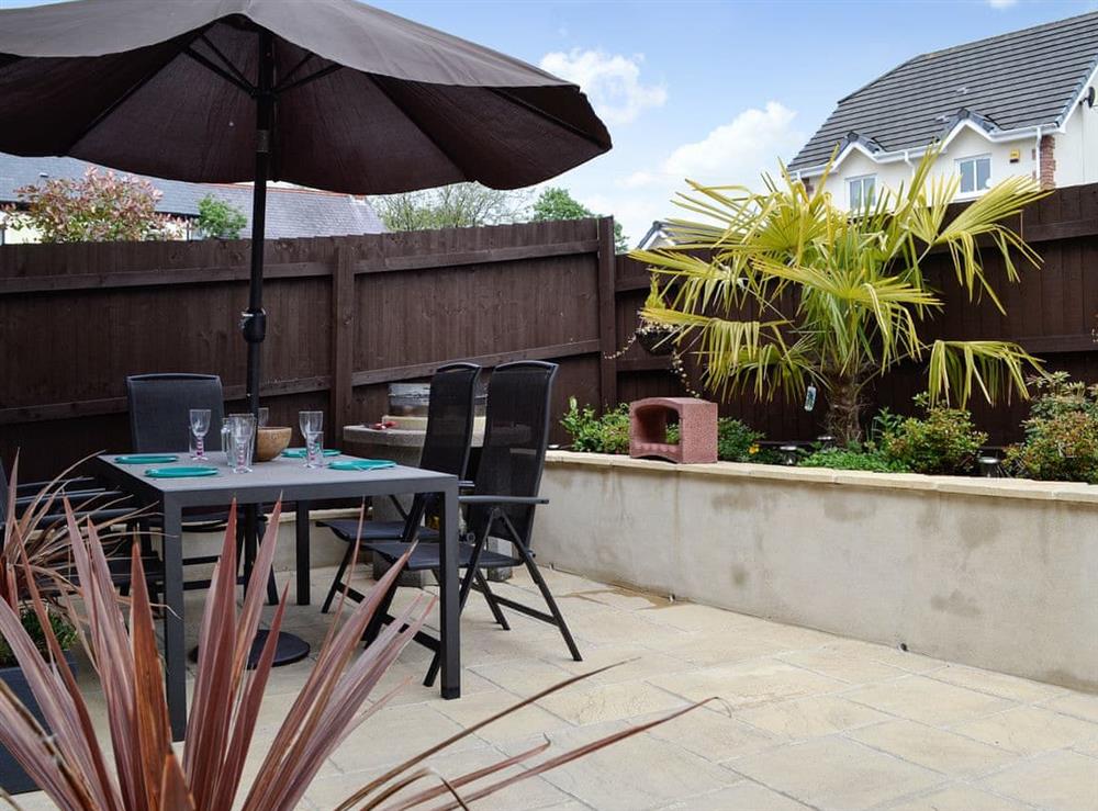 Outdoor dining area with BBQ (photo 2) at Ty Cerrig in Cwmgors, near Ammanford, Glamorgan, Dyfed