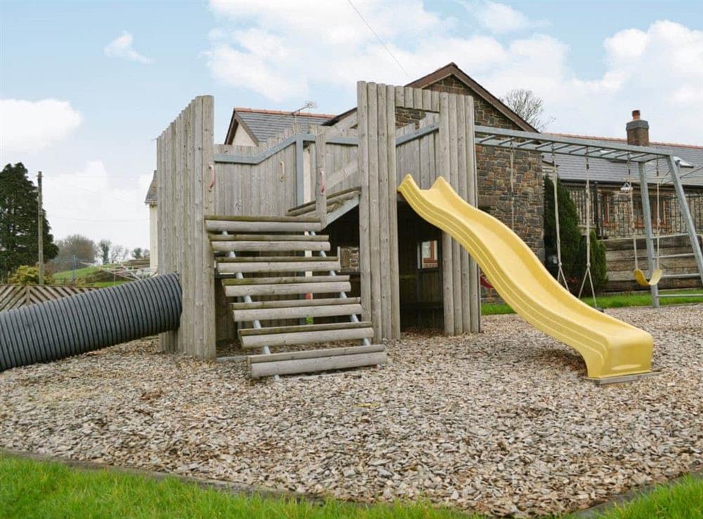 Children’s play area at Ty Cerrig Farmhouse in St Clears, near Laugharne, Dyfed