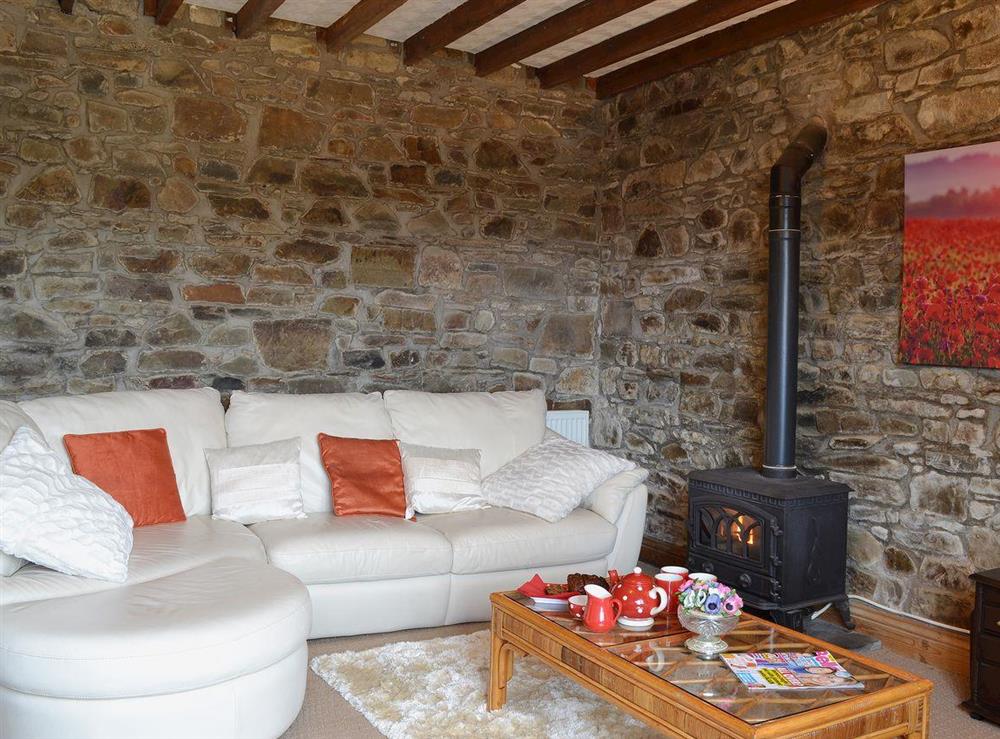 Beamed living room at Ty Coch Cottage in Near Aberaeron, Dyfed