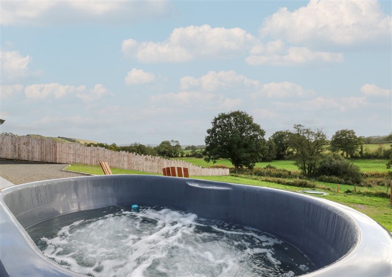 Spend some time in the hot tub at Ty Crwn - The Roundhouse, Near Lampeter