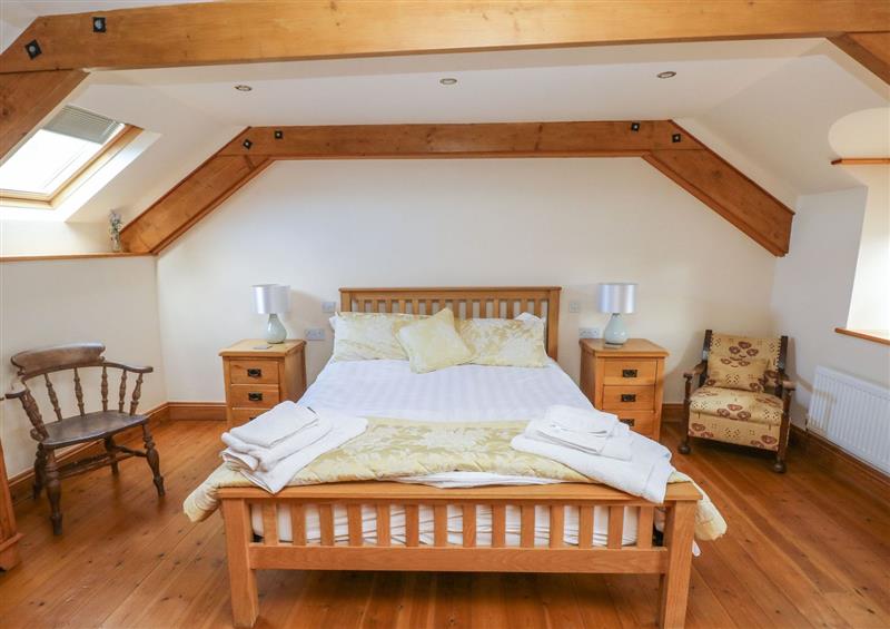 A bedroom in Ty Crydd (photo 2) at Ty Crydd, Llansaint near Kidwelly
