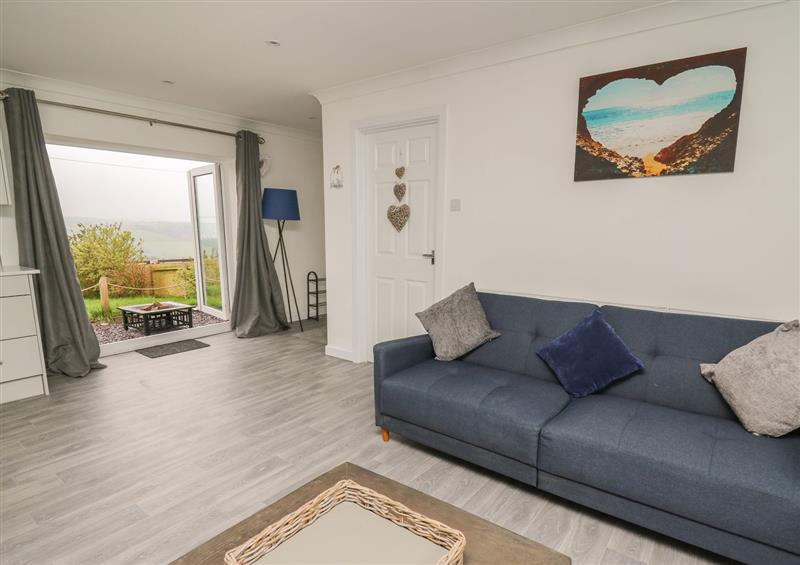 Enjoy the living room at Ty Cwtch, Llangynin near St Clears