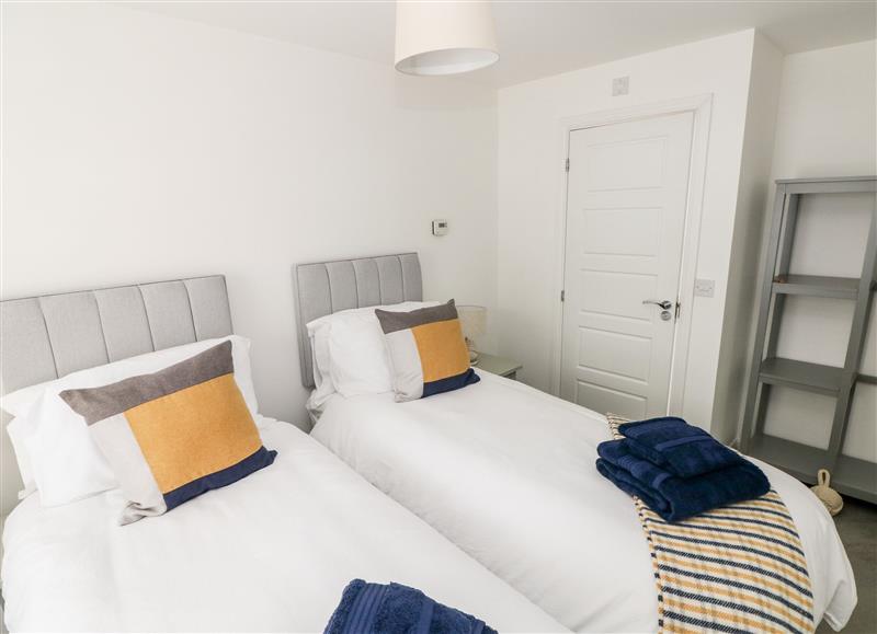 A bedroom in Ty Glas at Ty Glas, Ogmore-by-Sea near St Brides Major