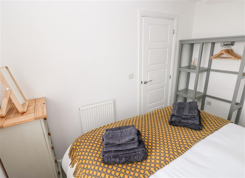 This is a bedroom at Ty Glas, Ogmore-by-Sea near St Brides Major