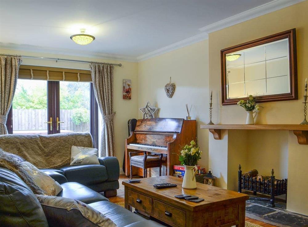 Comfortable living room at Ty Glyndwr in Lower Cwm-twrch, near Llandovery, Powys