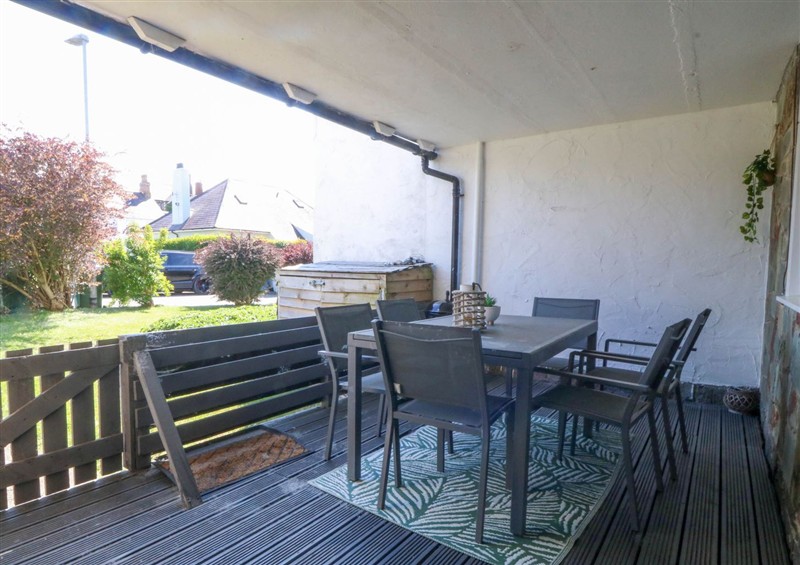 Enjoy a cup of tea on the patio at Ty Golau, Llanbedrog