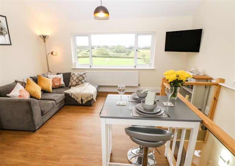 Relax in the living area at Ty Gwair (The Hayloft), Caernarfon
