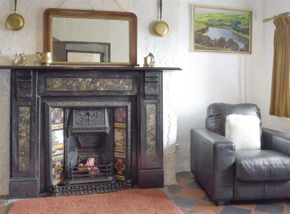 Second living room with heritage fireplace at Ty-Gwyn in Cynheidre, near Llanelli, Dyfed