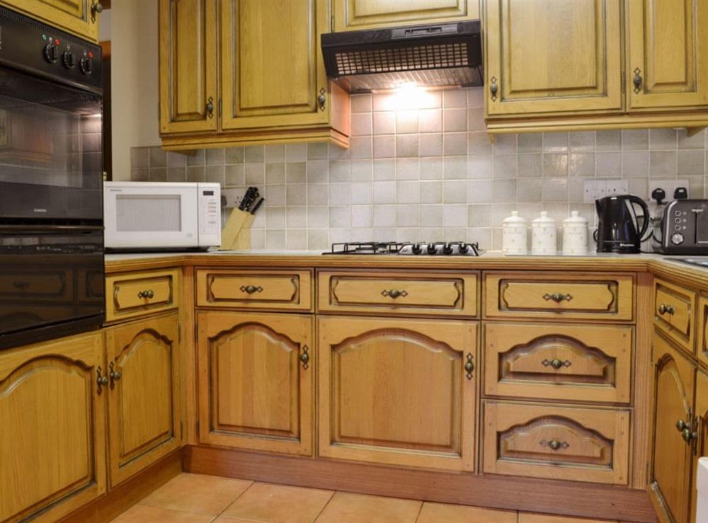 Well equipped kitchen/ dining room (photo 2) at Ty Gwyn in Llanbedrgoch, Anglesey., Gwynedd