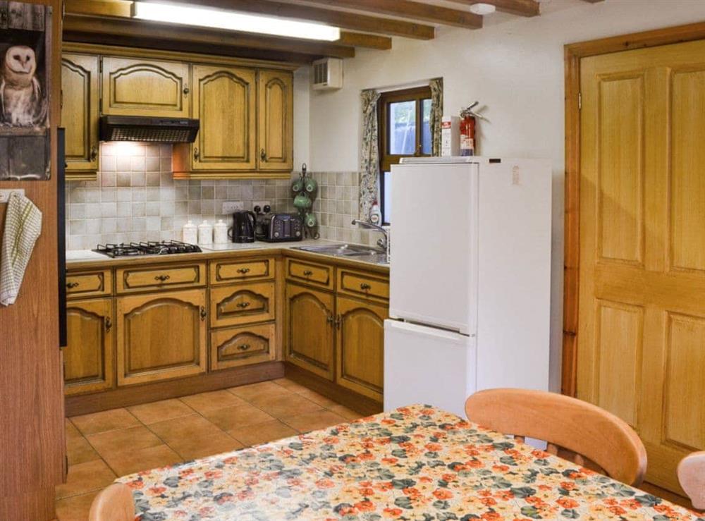 Well equipped kitchen/ dining room at Ty Gwyn in Llanbedrgoch, Anglesey., Gwynedd
