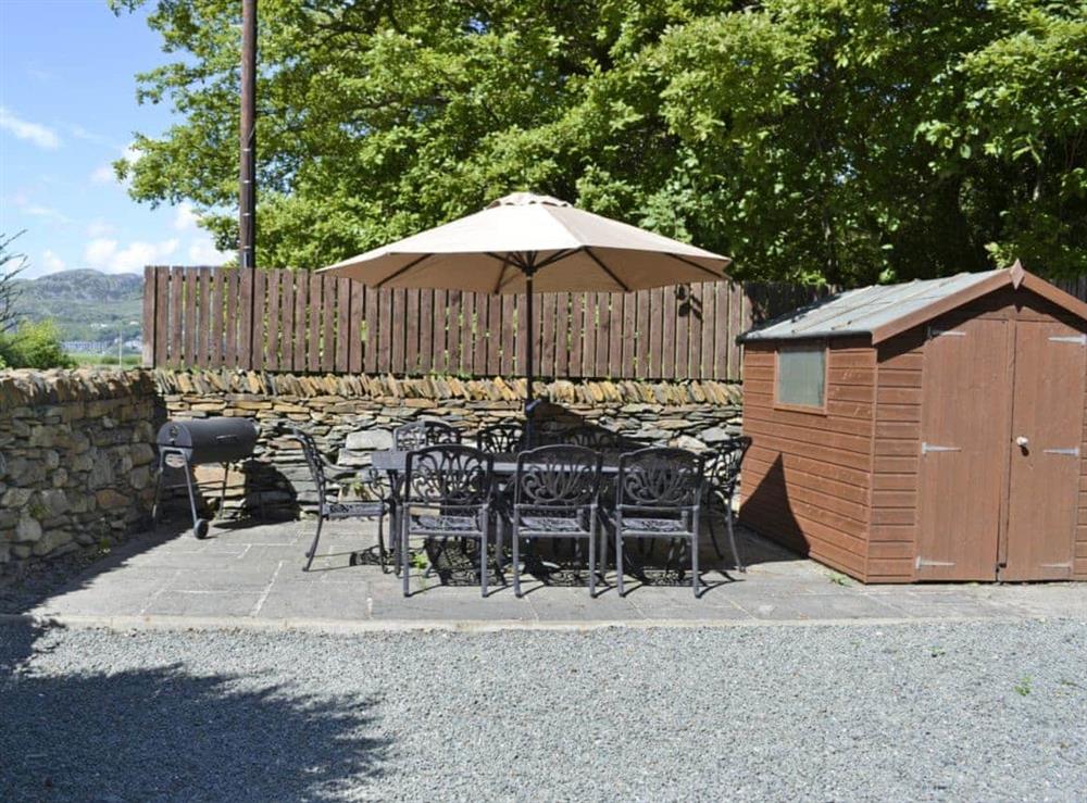Inviting patio area at Ty Hir in Arthog, Fairbourne, Gwynedd