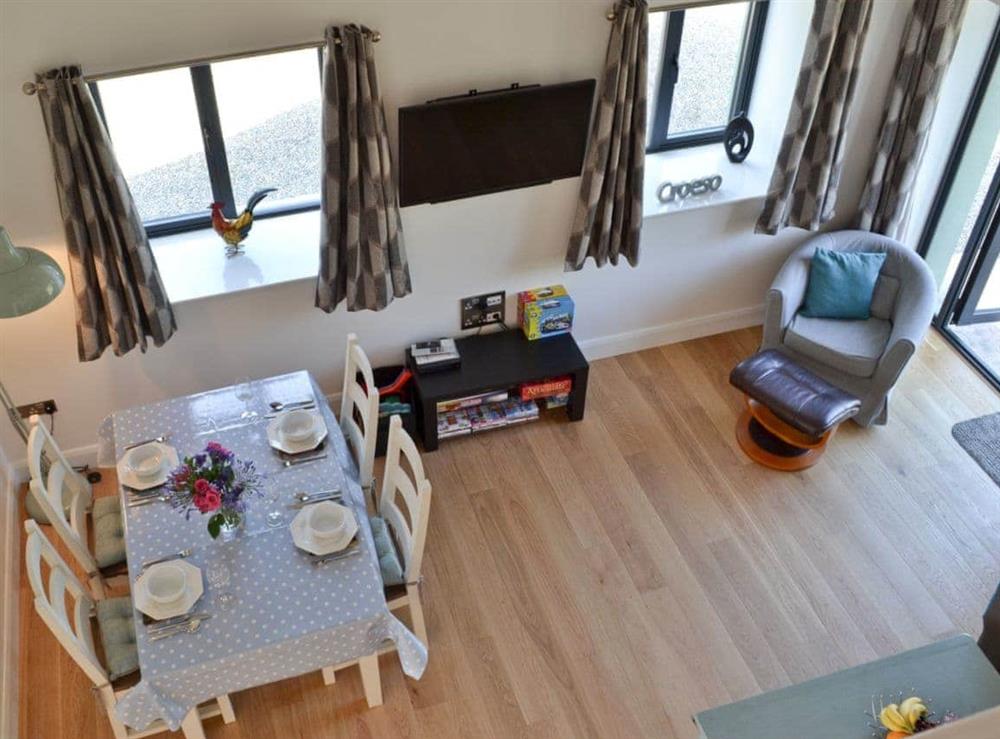 Open plan living space at Ty Isaf Cottage in Trapp, near Llandeilo, Dyfed