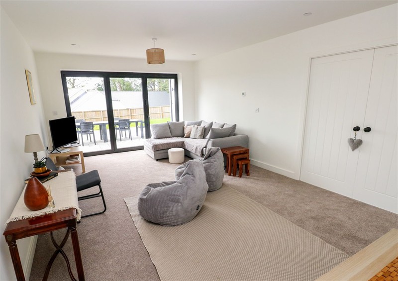 Relax in the living area at Ty Landsker, Houghton near Neyland
