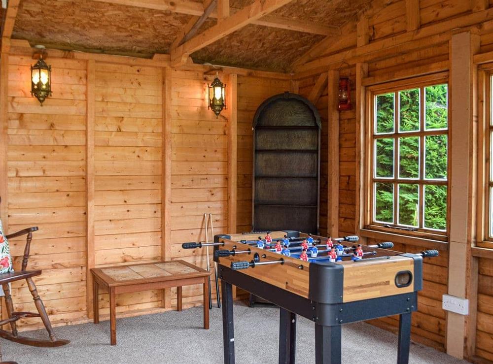 Games room at Ty Lewis Cottage in Pwll near Llanelli, Carmarthenshire, Dyfed