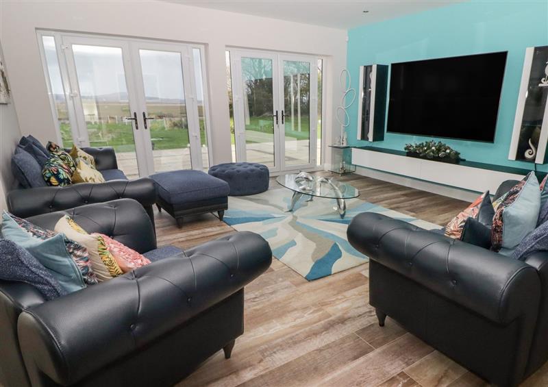 Relax in the living area at Ty Marlyn, Crofty