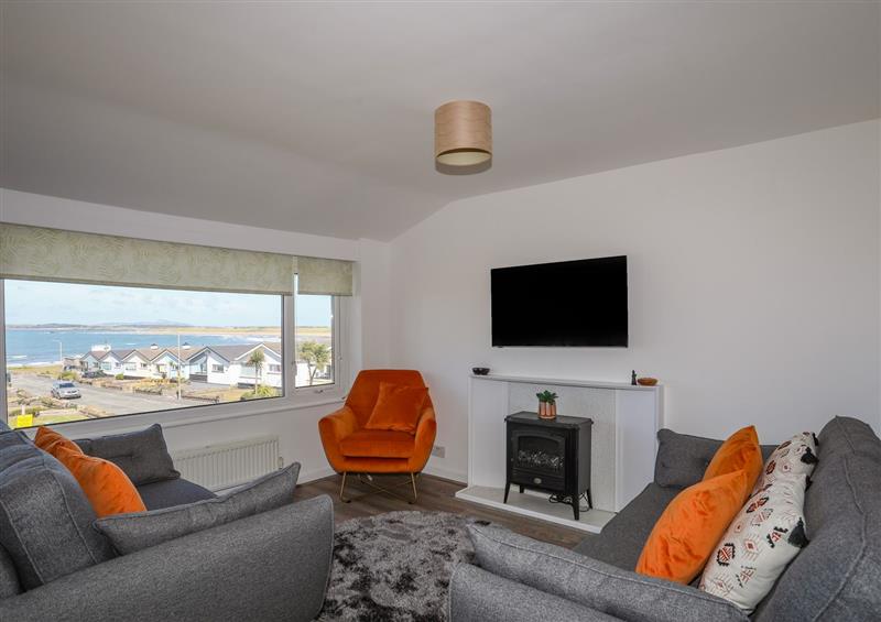 Relax in the living area at Ty Melyn, Rhosneigr