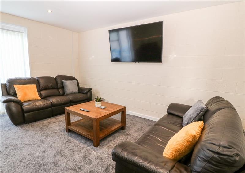 Relax in the living area at Ty Ni Annex, Llanfaelog