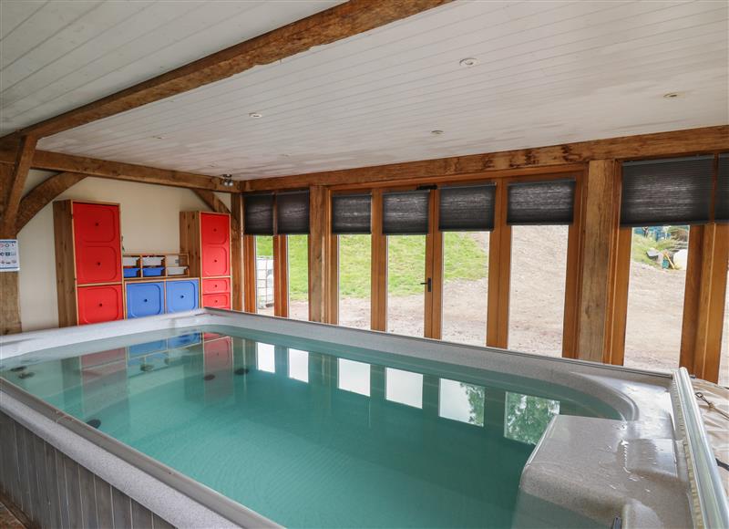 Spend some time in the pool at Ty Nofio, Talybont-On-Usk