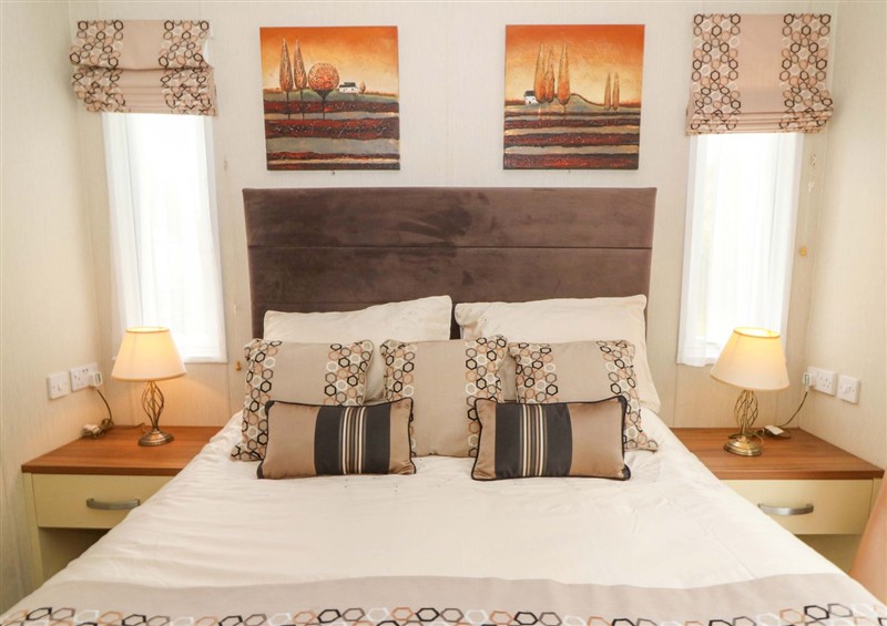 A bedroom in Ty Seren at Ty Seren, New Quay