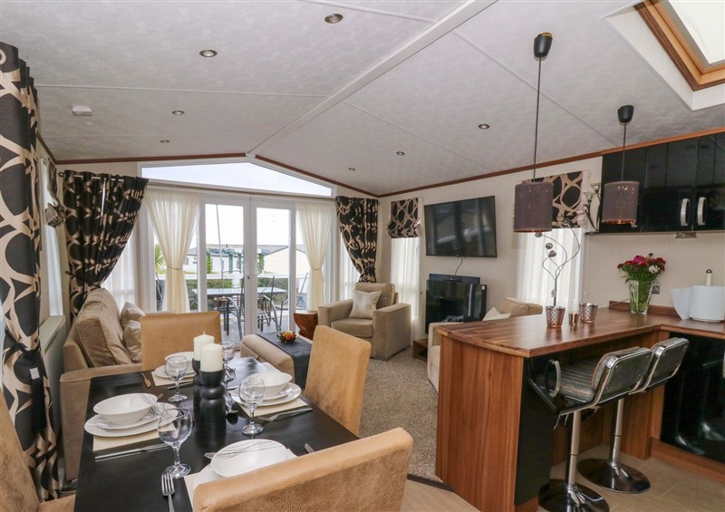Relax in the living area at Ty Seren, New Quay