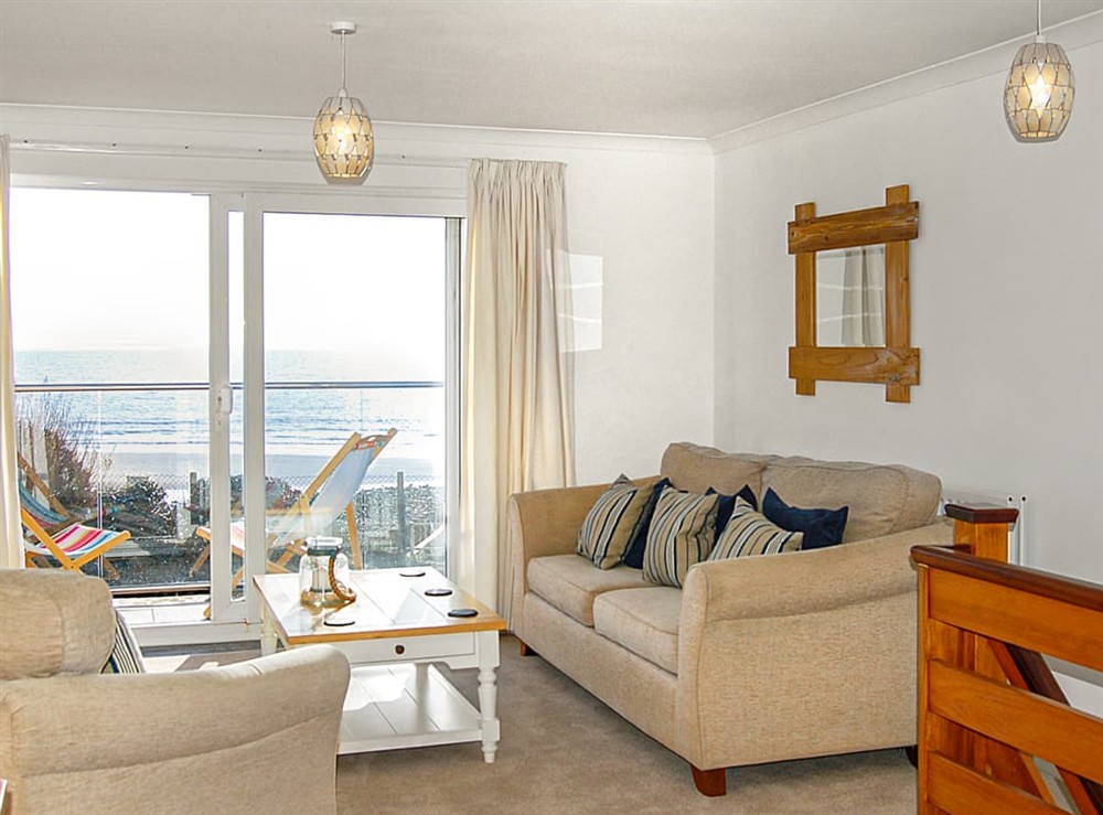 Living area at Ty Traeth Beach House in Tywyn, Gwynedd