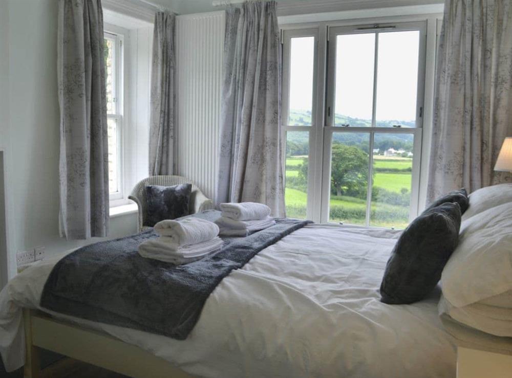 Comfortable double bedroom (photo 2) at Tyllwyd Farmhouse in Capel Bangor, near Aberystwyth, Dyfed
