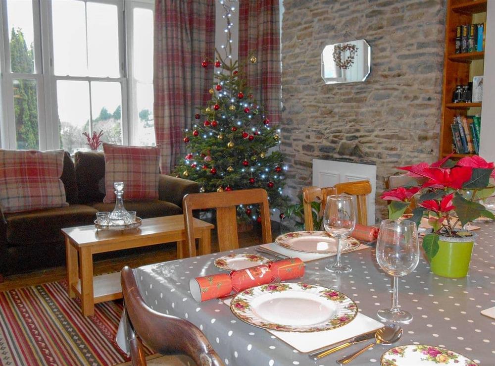 Delightful living/dining room decorated for Christmas at Tyllwyd Farmhouse in Capel Bangor, near Aberystwyth, Dyfed
