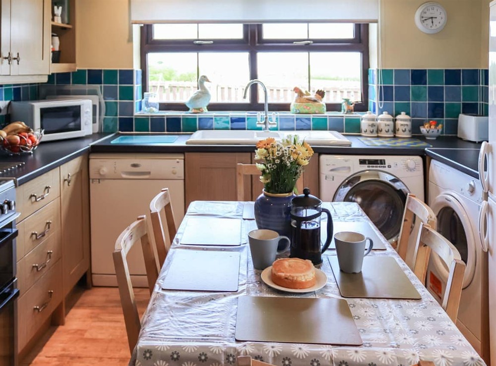 Kitchen/diner at Tyn Cae Cottage in Rhostrehwfa Nr Llangefni, Gwynedd