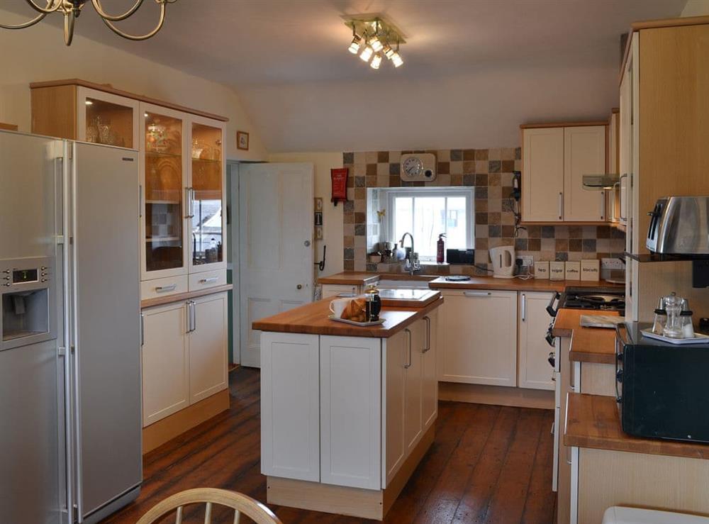 Kitchen with dining area (photo 4) at Tyn Lon in Moelfre, near Bangor, Anglesey, Gwynedd
