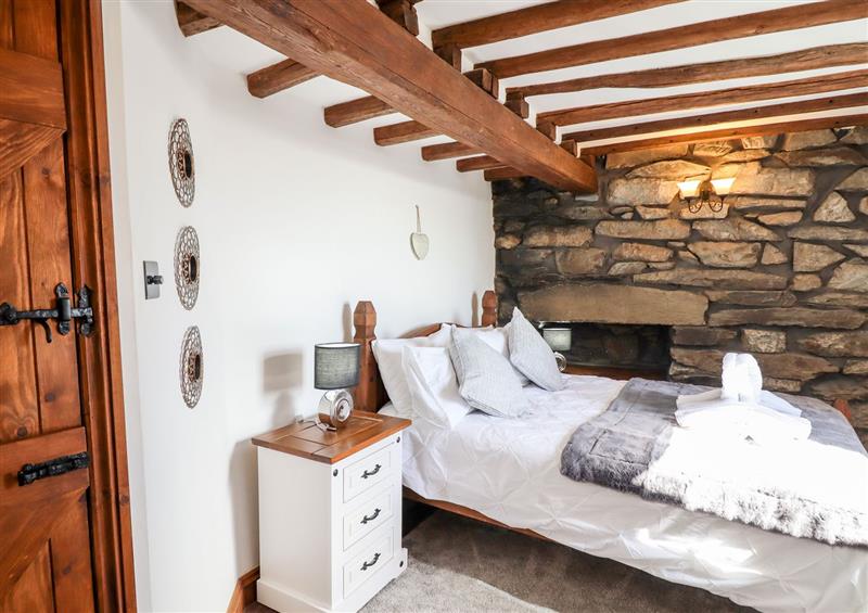 This is a bedroom at Tyn-Y-Ffynnon Cottage, Barmouth
