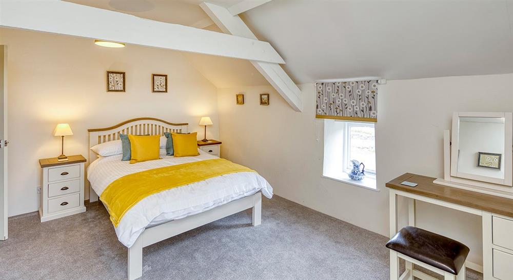 The double bedroom at Ty'n Y Parc Barn in Rhiw, Gwynedd