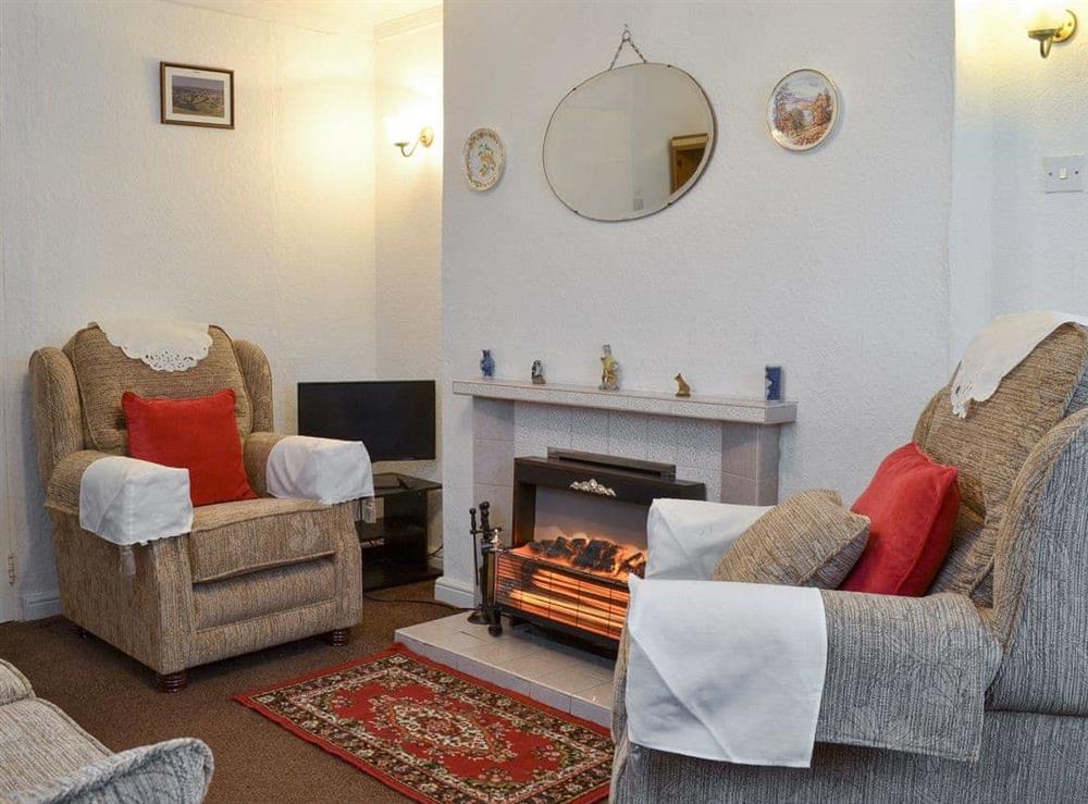 Cosy living and dining room at Tynlone Villa in Swyddffynnon, near Devils Bridge, Dyfed