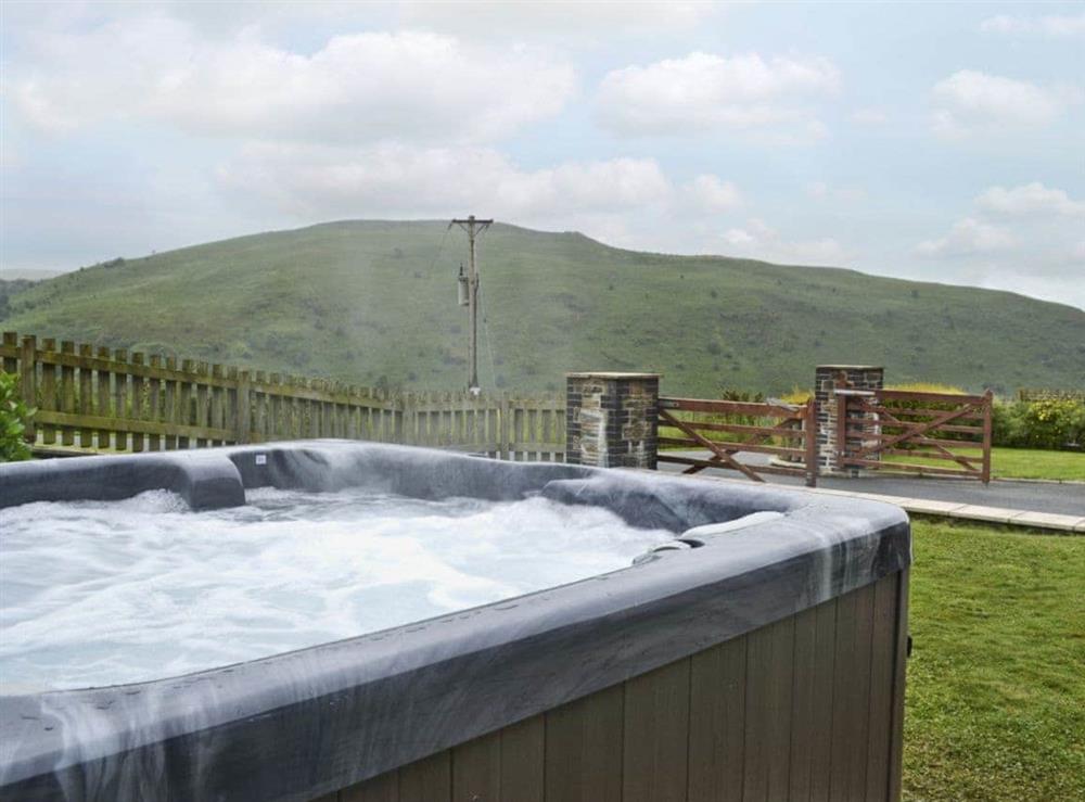 Relaxing hot tub with far reaching views at Eithinog, 