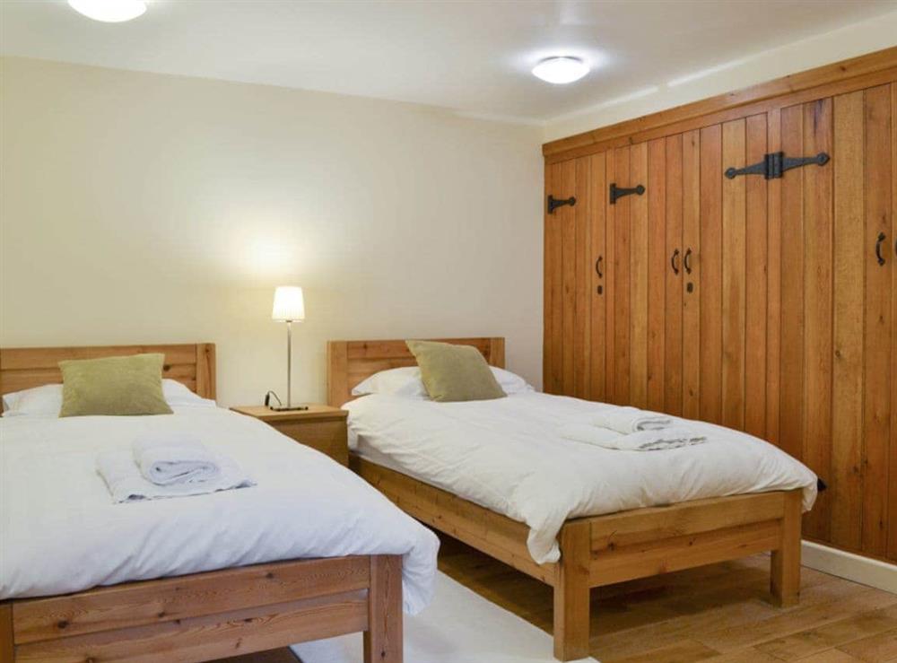 Good sized twin bedroom at Tythe Barn in Grindleford, Derbyshire., South Yorkshire