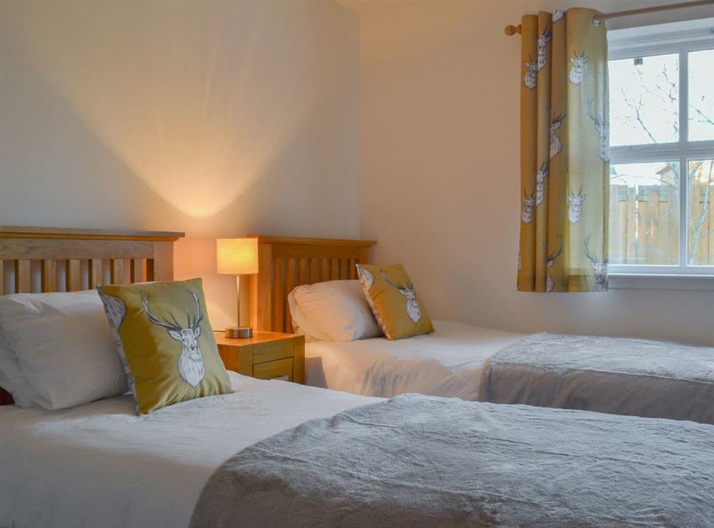 Twin bedroom at Uaine Cottage in Aviemore, Inverness-Shire