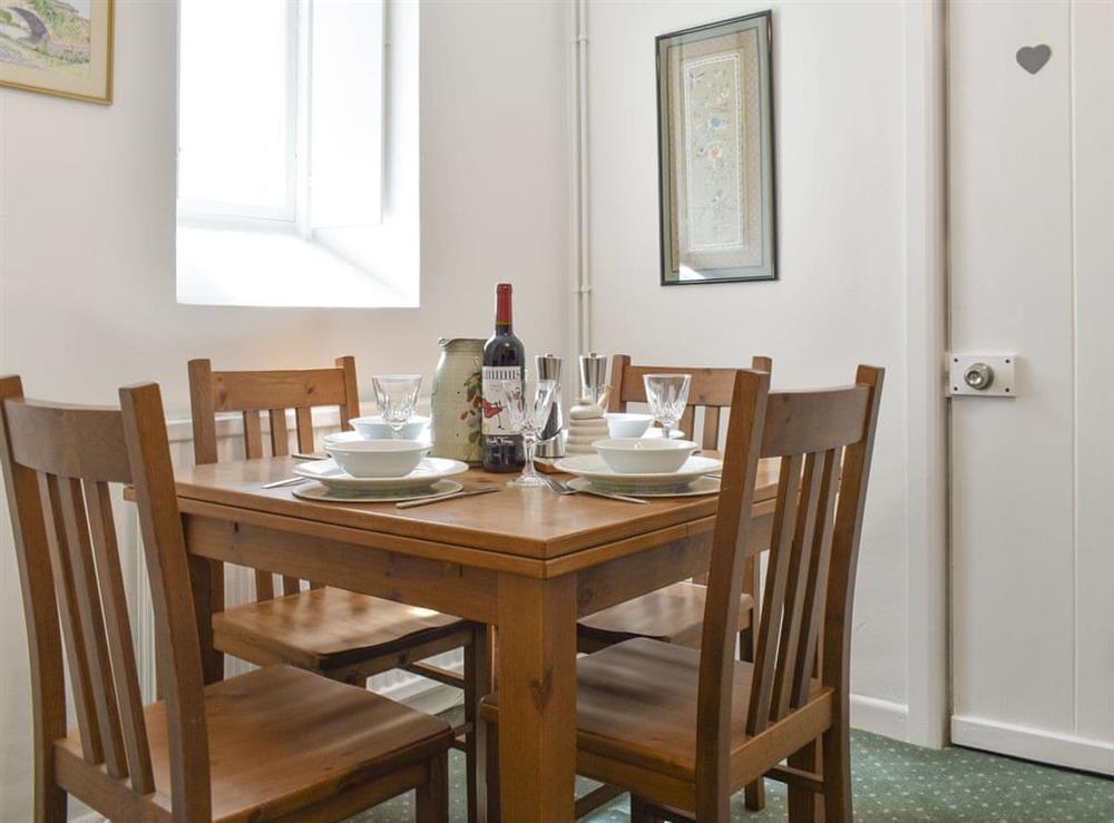 Light and airy dining area at Underhill Cottage in Arnside, near Grange-over-Sands, Cumbria