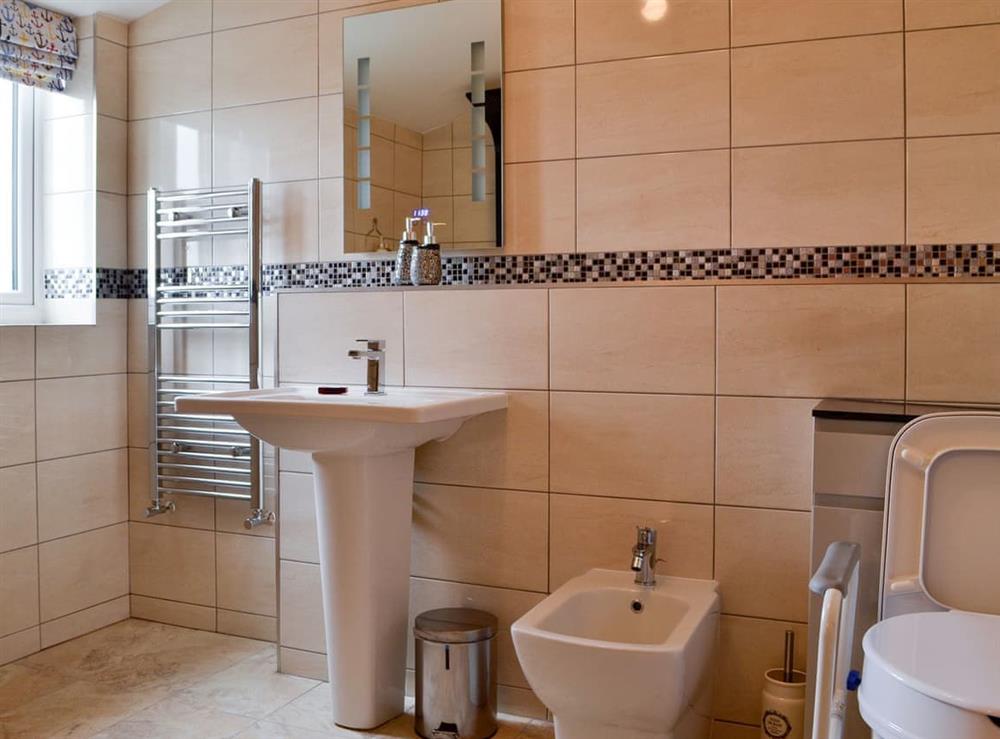 Tiled wet room with accessible facilities