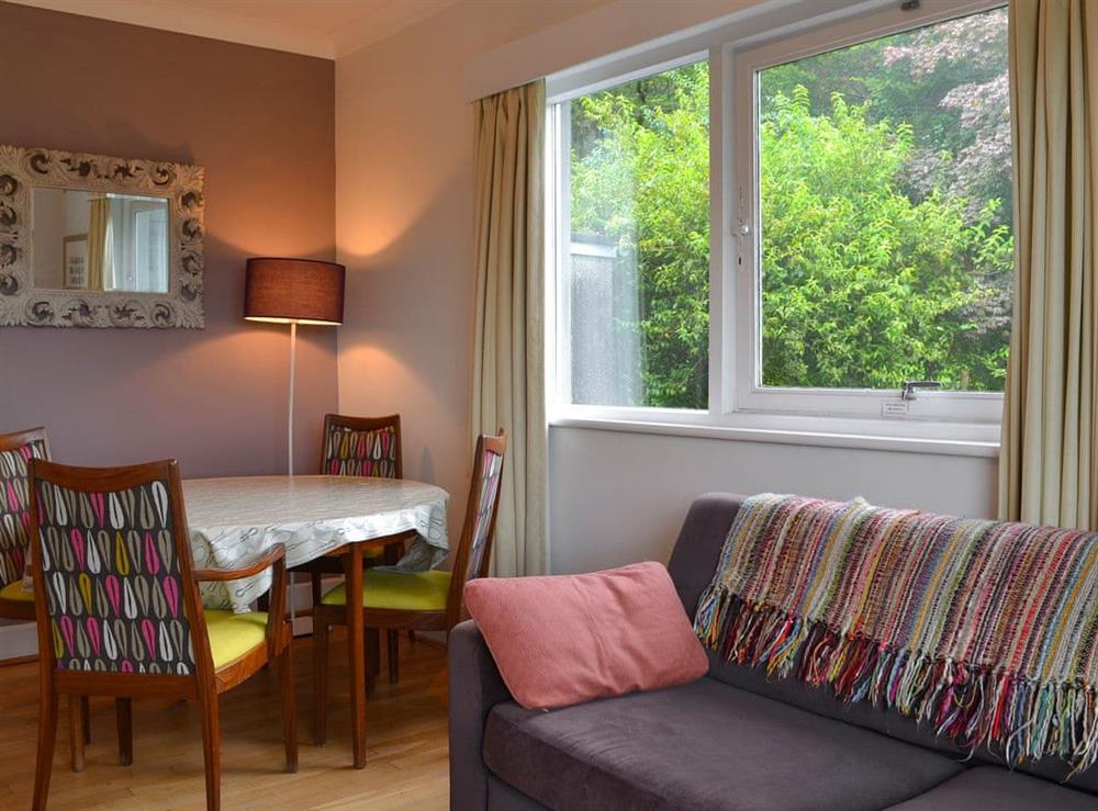 Delightful sitting room with breakfast area at Unerigg in Grasmere, Cumbria