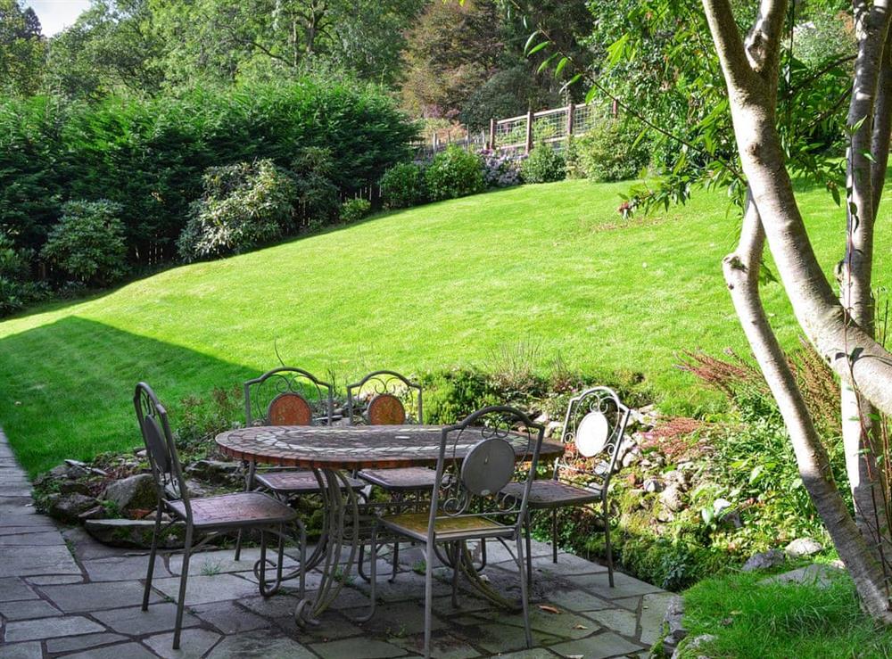 Peaceful patio area and spacious garden at Unerigg in Grasmere, Cumbria