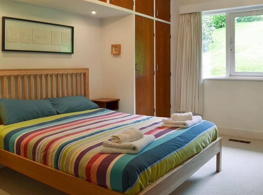 Stylish bedroom with double bed at Unerigg in Grasmere, Cumbria