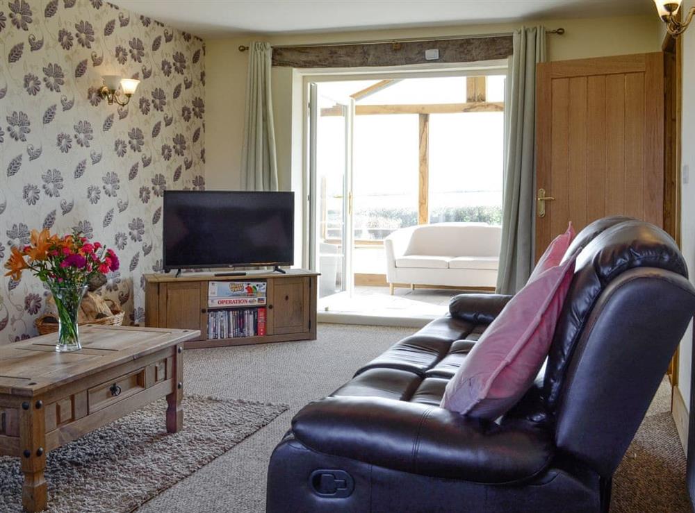 Spacious living room with sunroom at Upper Close in Walton, near Presteigne, Powys