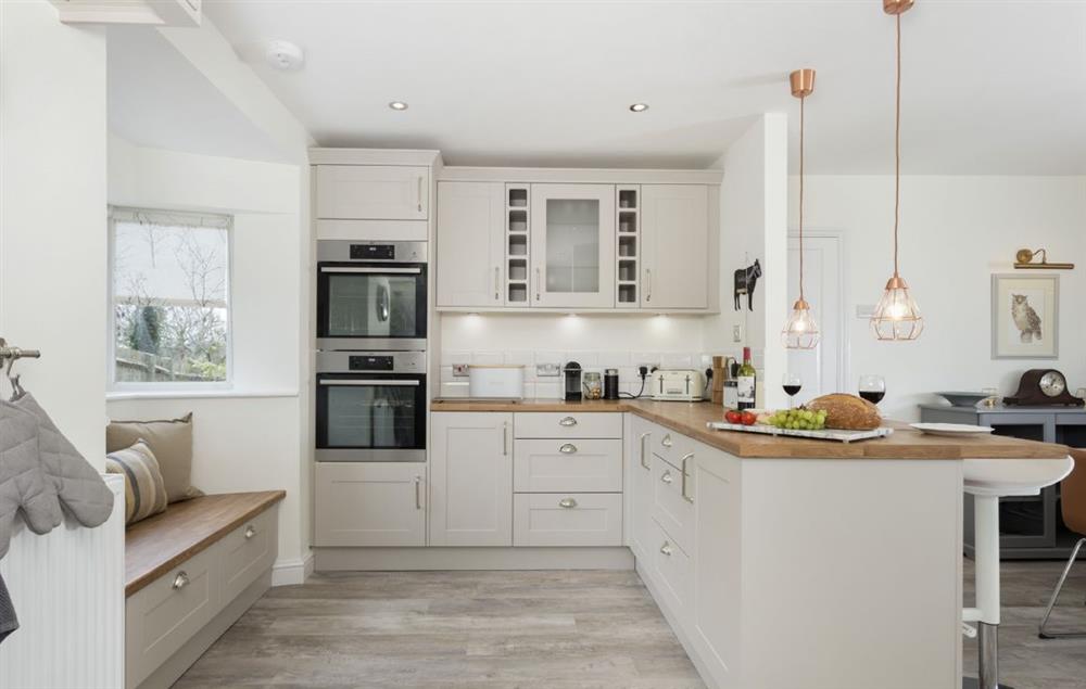 Fully equipped kitchen and clever lighting at Upper End House, Shipton-under-Wychwood