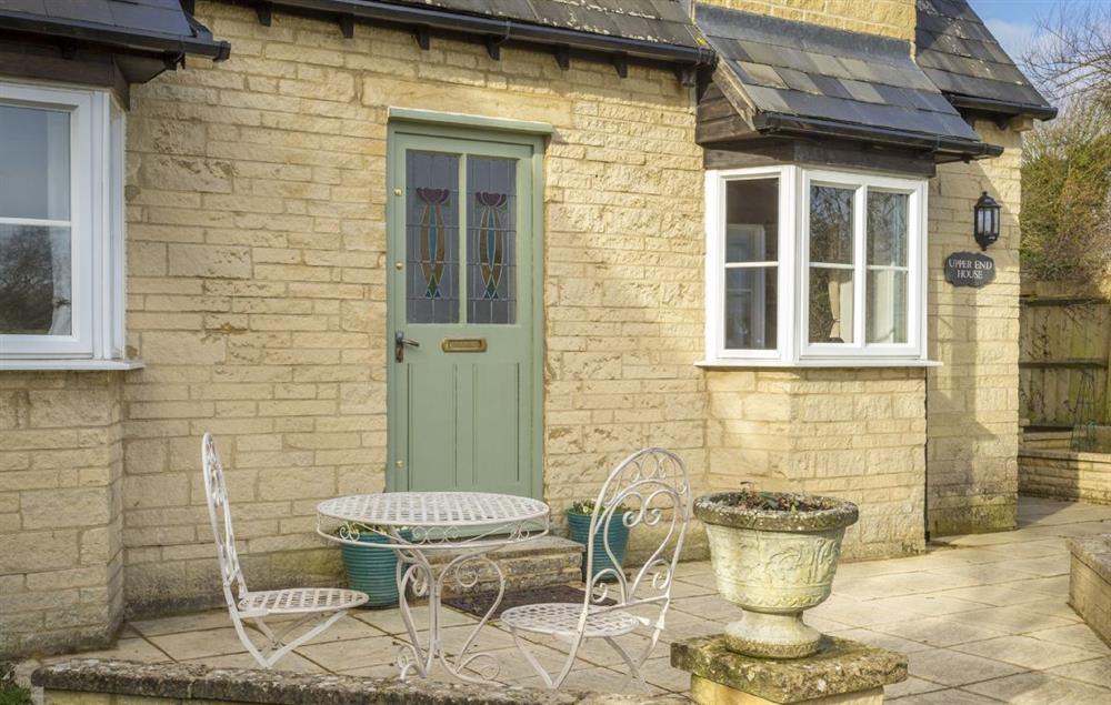 Seating for two at the rear of the property at Upper End House, Shipton-under-Wychwood
