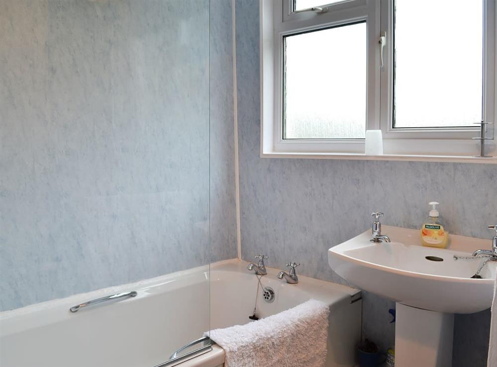Bathroom with shower over the bath at Upper Ffinnant in Soar, near Brecon, Powys, Wales