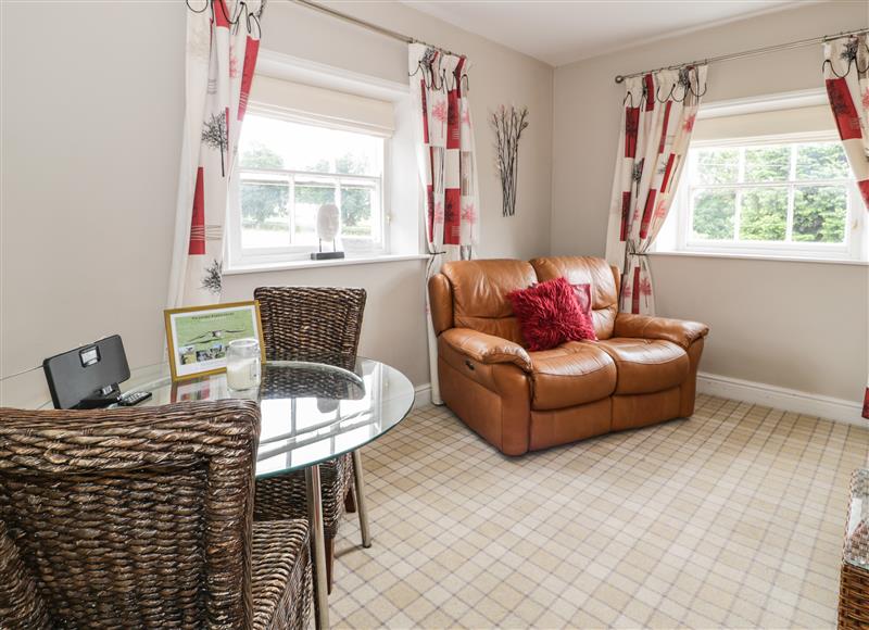 Enjoy the living room at Upper Gardeners Cottage, Llandyrnog near Denbigh