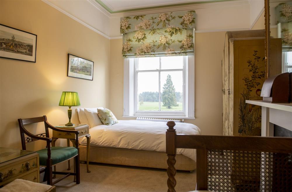 Bedroom four overlooking the grounds at Upper Helmsley Hall, York
