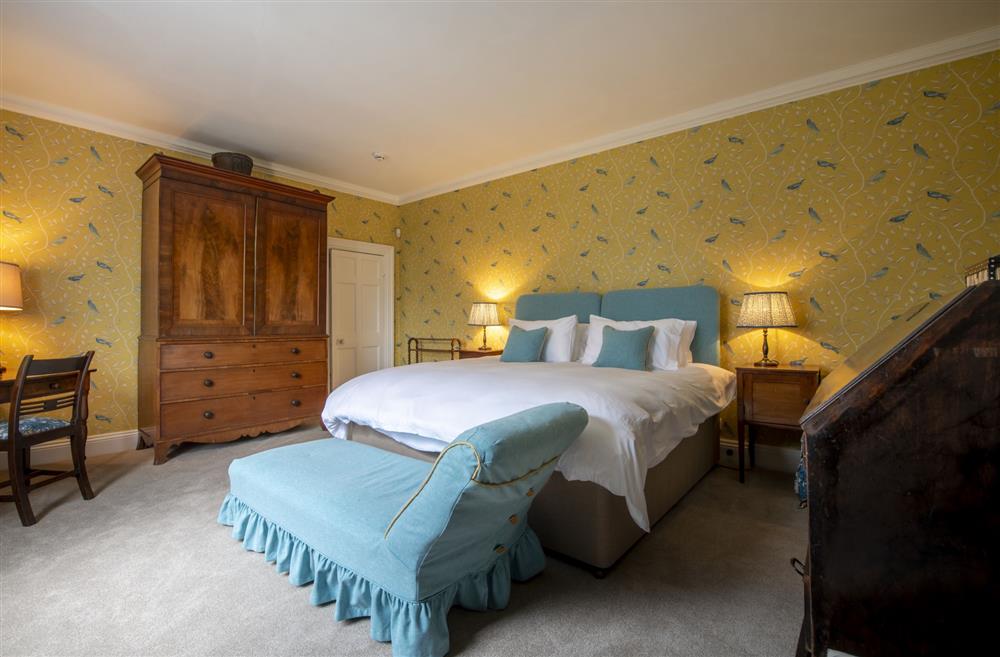 Bedroom six with a 6’ super-king size zip and link bed at Upper Helmsley Hall, York