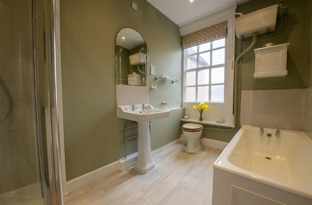 Family bathroom in the East wing with walk-in shower at Upper Helmsley Hall, York