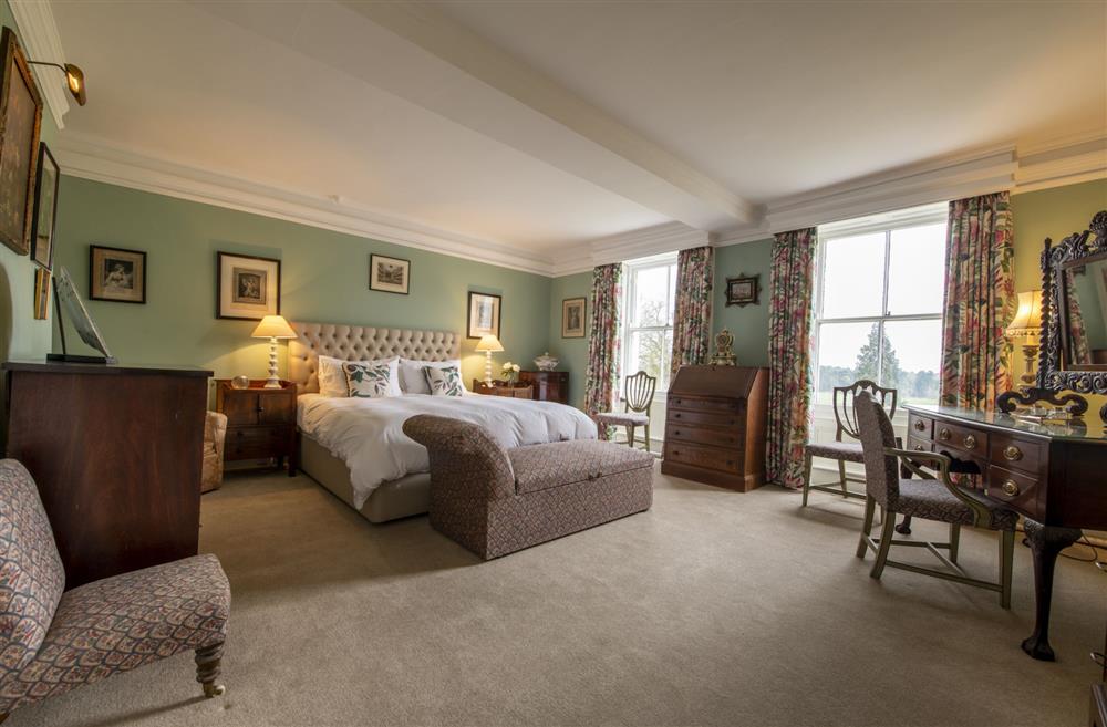 Spacious bedroom five with a super-king size bed at Upper Helmsley Hall, York